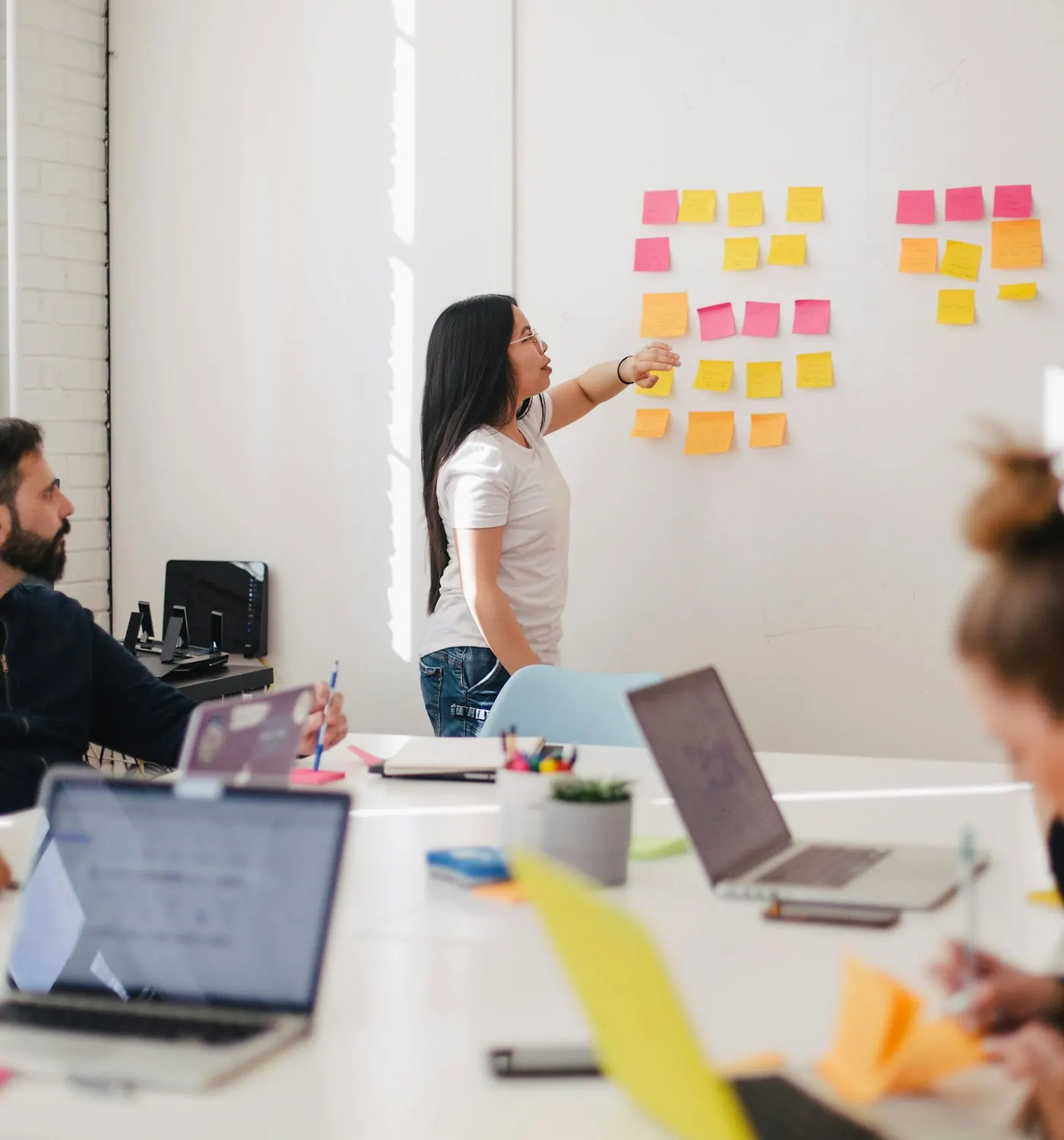 Strategist mapping an SEO plan on a whiteboard